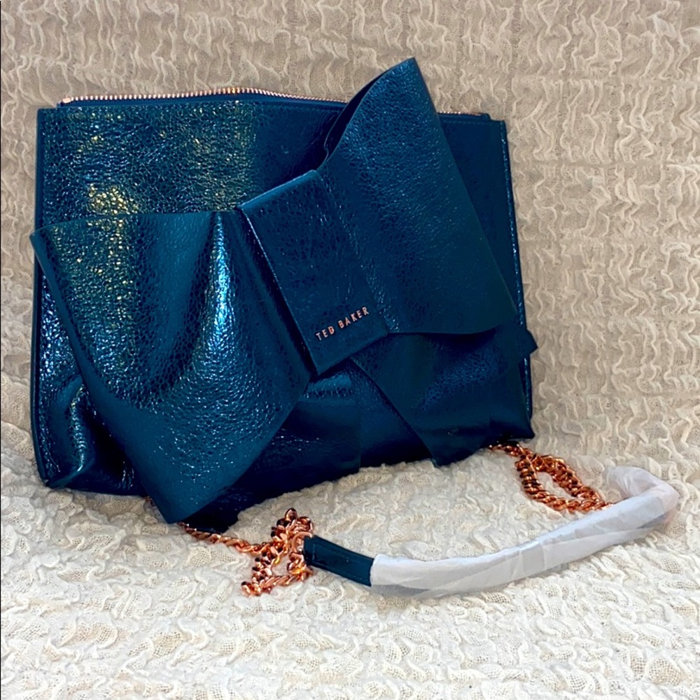 Crackle metallic blue bow clutch
